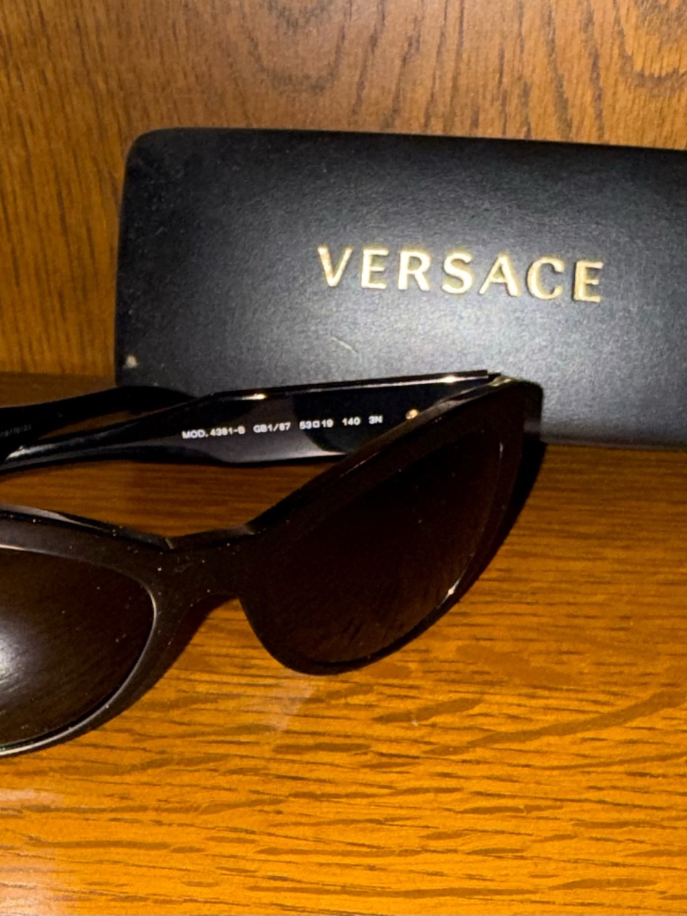 Versace Black Cat-Eye Sunglasses with Gold Logo Detail